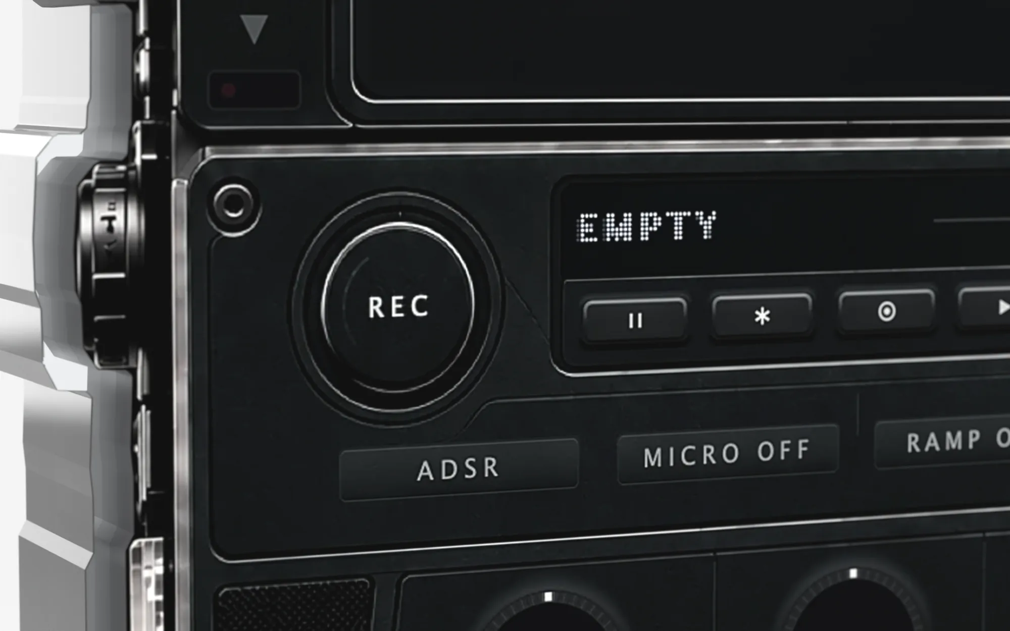 Close-up of the REC button and the transport keys beside it